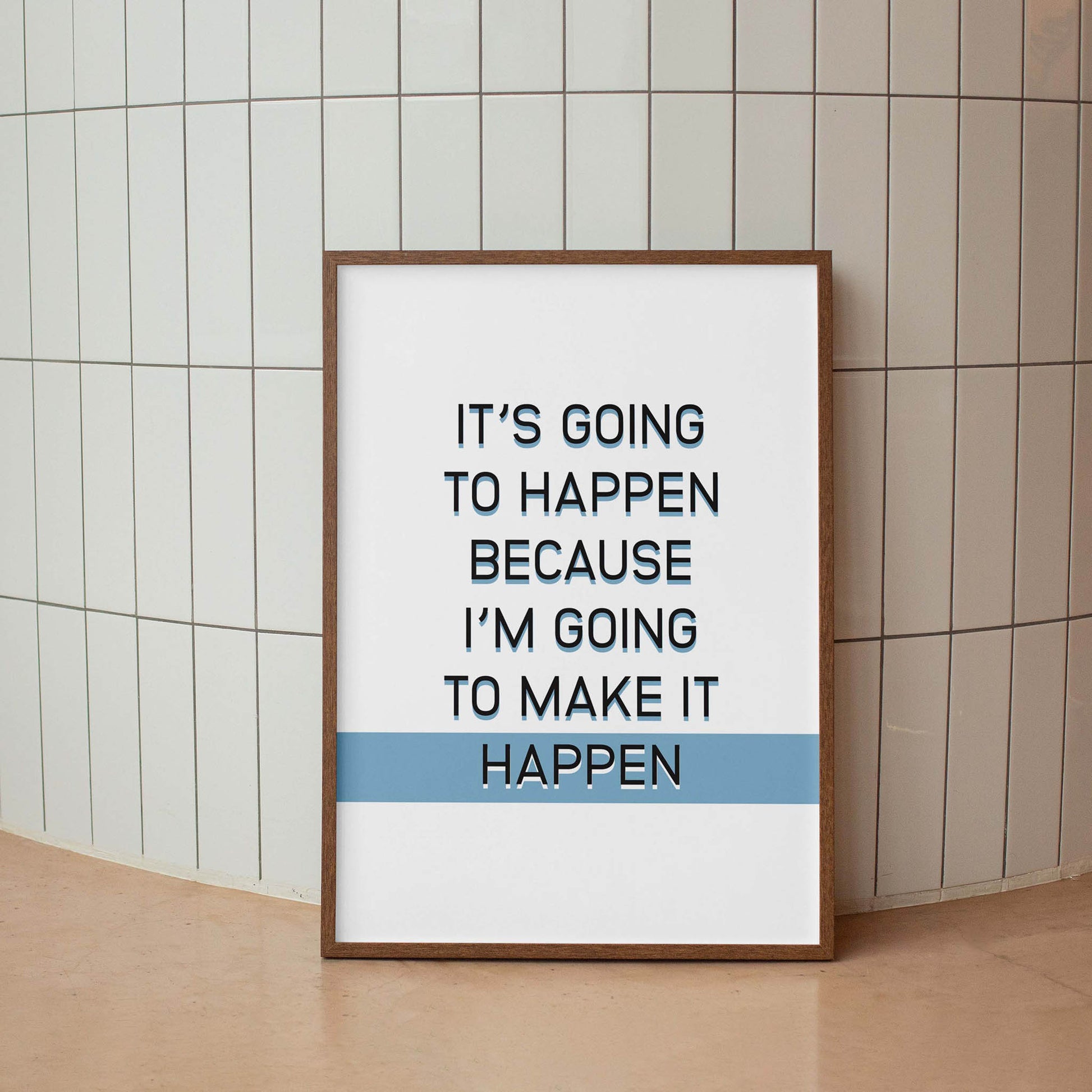 Motivational printable wall art featuring the quote 'It’s going to happen because I’m going to make it happen' in bold black font with a light blue highlight on the word 'HAPPEN' ideal for goal-setters, entrepreneurs, or inspiring office and home decor