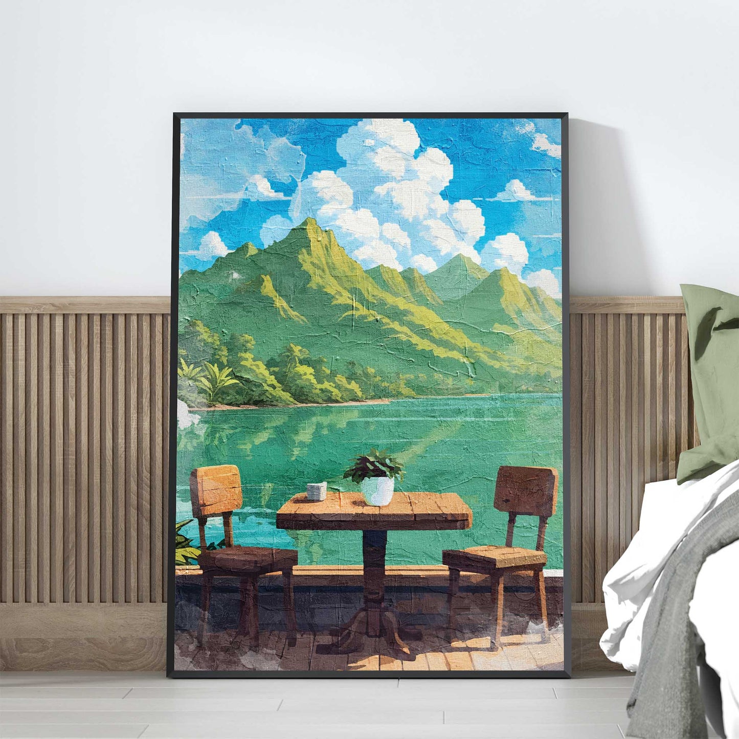 Tropical lakefront printable wall art featuring a rustic wooden table with two chairs overlooking calm turquoise water and lush green mountains under a bright blue sky with fluffy clouds - perfect for vacation-inspired, outdoor dining, or serene nature-themed decor