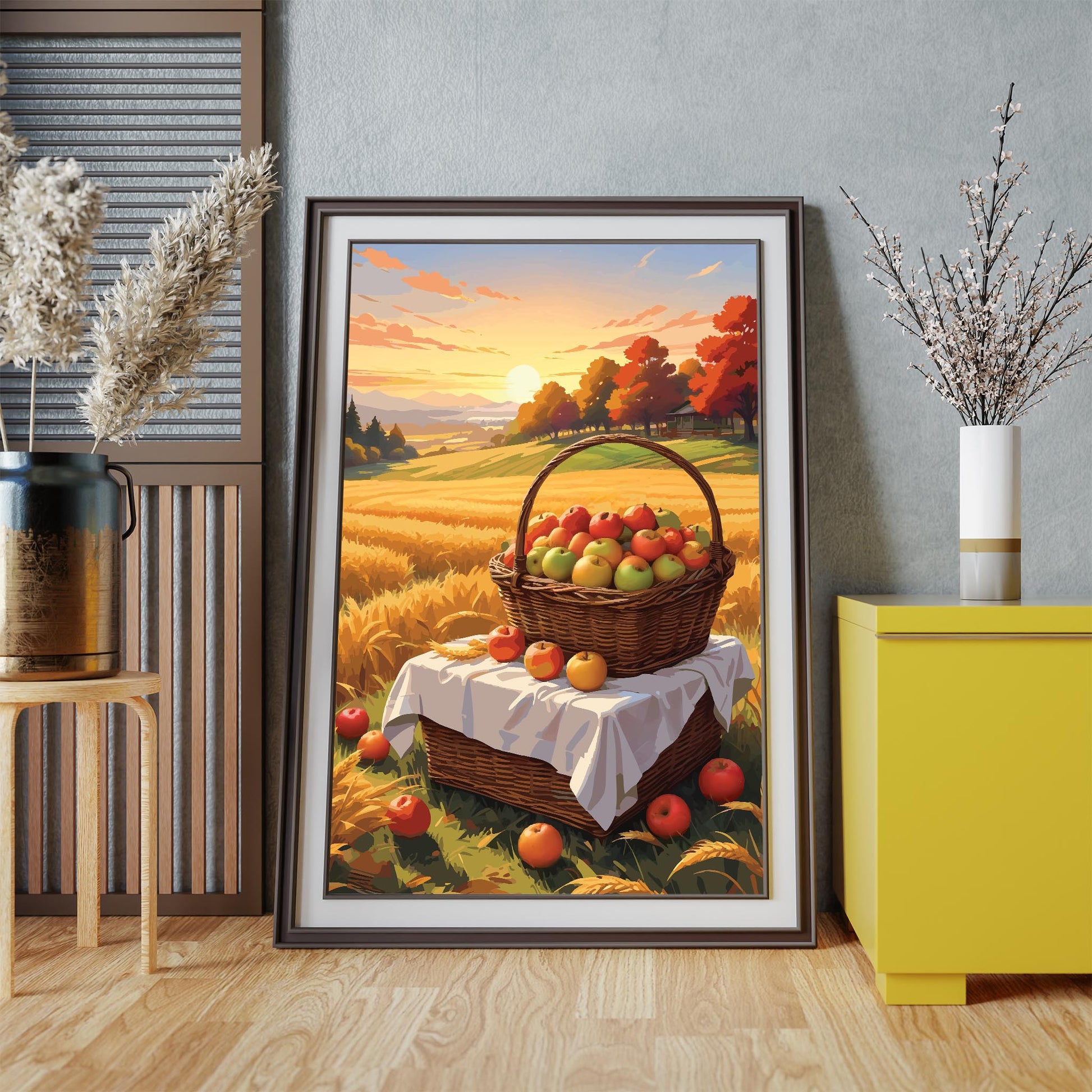 Digital wall art of a basket filled with apples in a golden wheat field at sunset, surrounded by scattered apples and autumn trees in the background