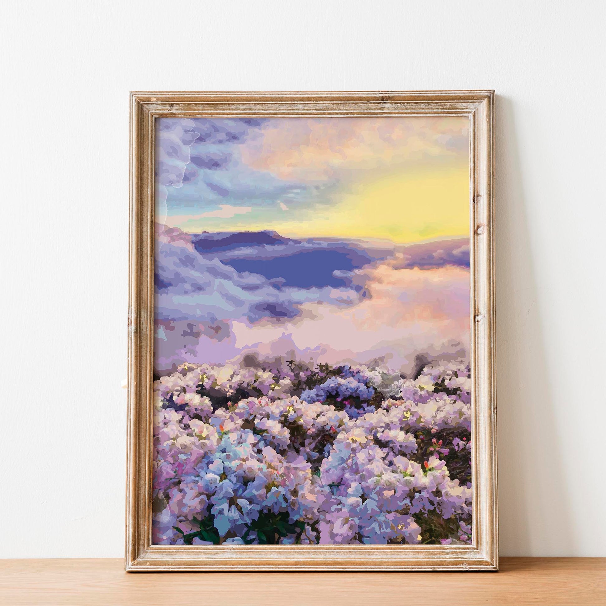Dreamy floral landscape printable wall art featuring a field of pastel blossoms beneath a radiant sky at sunset, perfect for romantic, tranquil, or nature-inspired interior decor.