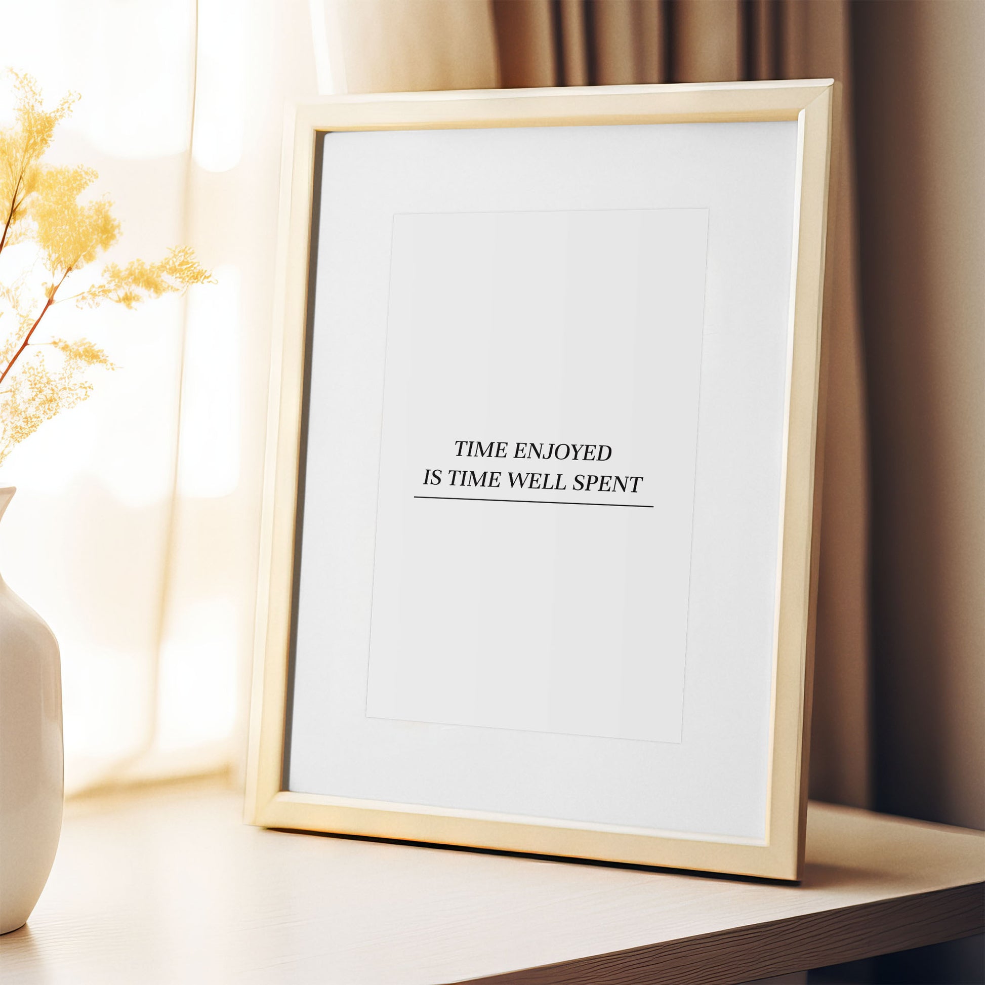 Minimalist printable wall art featuring the inspirational quote 'Time enjoyed is time well spent' in elegant black serif font with an underline, set against a clean white background, perfect for calm, modern, and mindful interiors