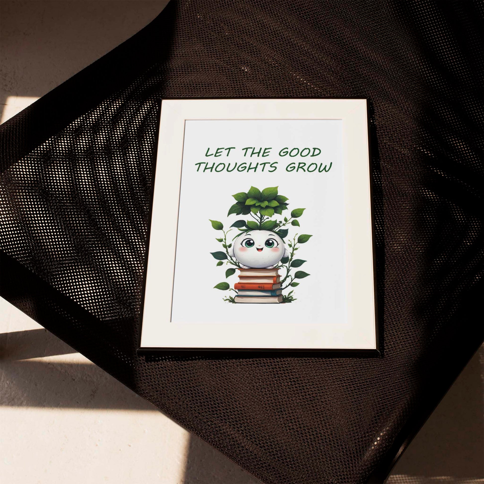 Whimsical printable wall art featuring a smiling plant character growing from a stack of books with leafy vines, paired with the uplifting quote 'Let the Good Thoughts Grow' perfect for kids’ rooms, classrooms, or positivity-focused spaces