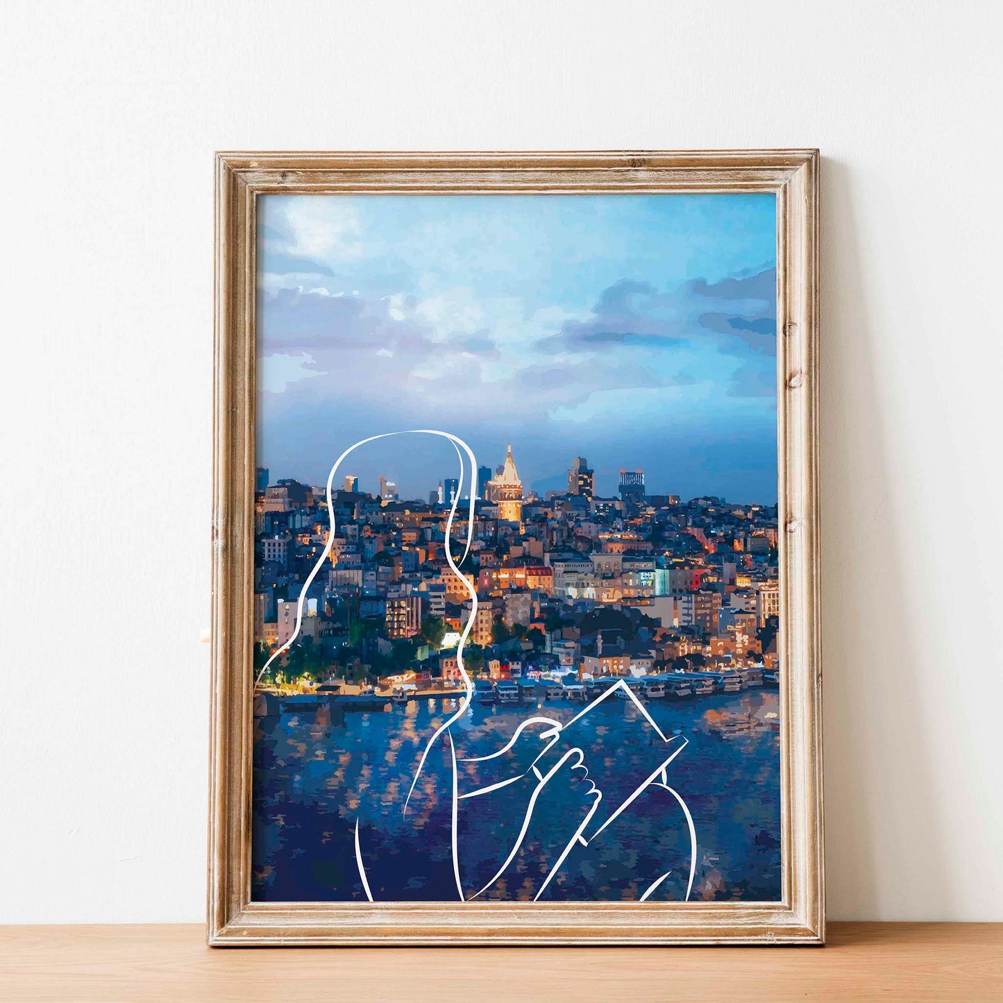 Scenic printable wall art featuring a glowing cityscape at dusk with an abstract white line drawing of a woman holding a book overlaying the waterfront view, a perfect blend of wanderlust, calm, and urban charm.