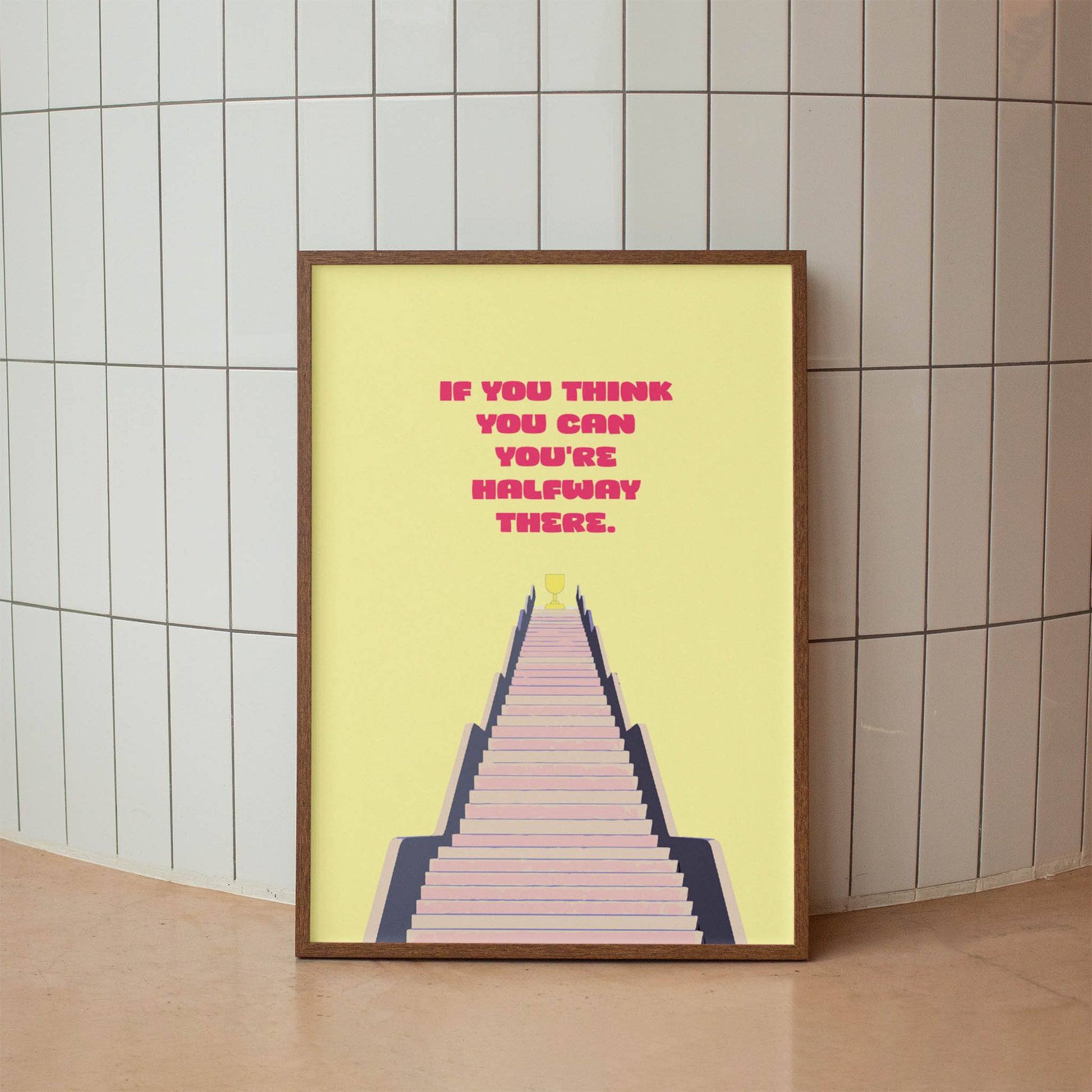 Motivational printable wall art featuring the quote 'If you think you can, you're halfway there' in bold pink text above a stylised staircase leading to a golden trophy, perfect for inspiring determination and positivity in home offices, gyms, or study areas.