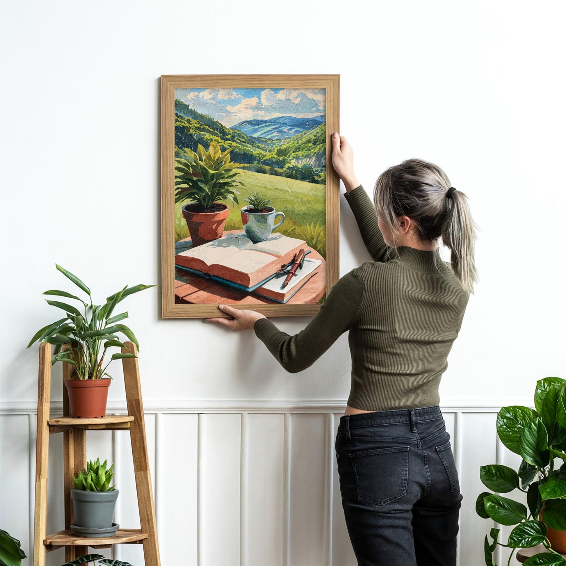 Peaceful printable wall art depicting an open book, pen, coffee cup, and potted plants on a table overlooking lush green hills and distant mountains under a sunny sky - perfect for writers, book lovers, or cozy nature-inspired decor