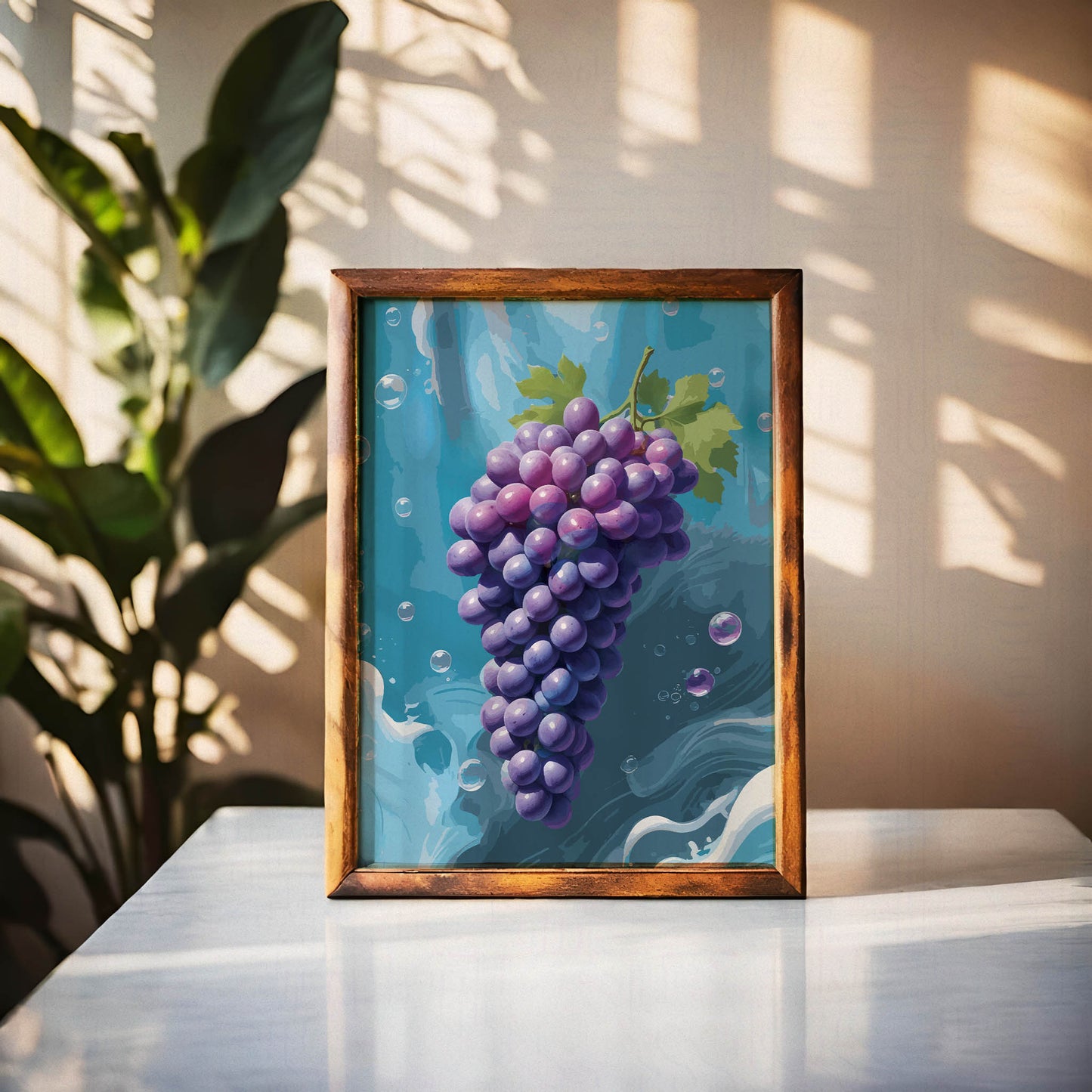 Printable wall art featuring a vibrant bunch of purple grapes with green leaves against a refreshing blue water-inspired background with bubbles, perfect for kitchen, dining room, or wine-themed decor.