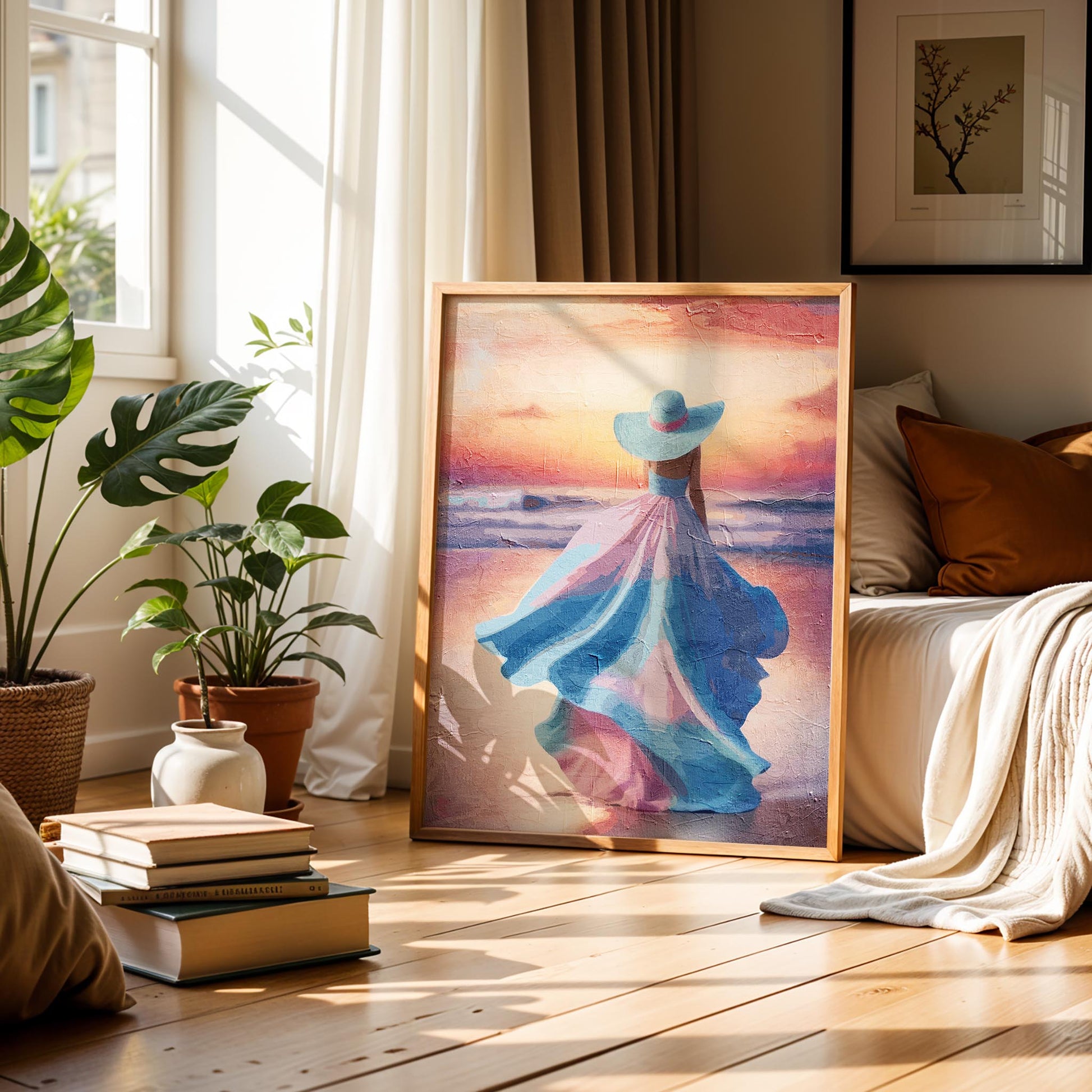 Elegant printable wall art of a woman in a flowing pastel pink and blue dress with a matching wide-brimmed hat, walking along the beach at sunset with soft waves and a glowing sky - perfect for feminine, coastal, or romantic-themed decor