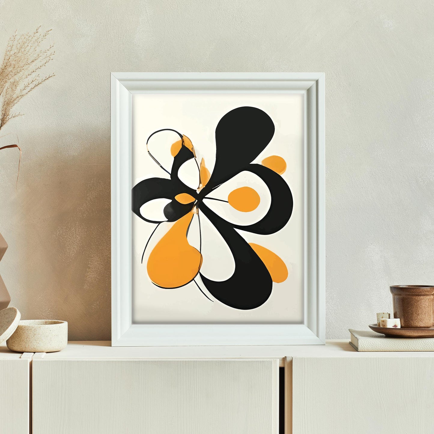 Modern abstract wall art featuring bold black and orange organic shapes with smooth curves on a light background