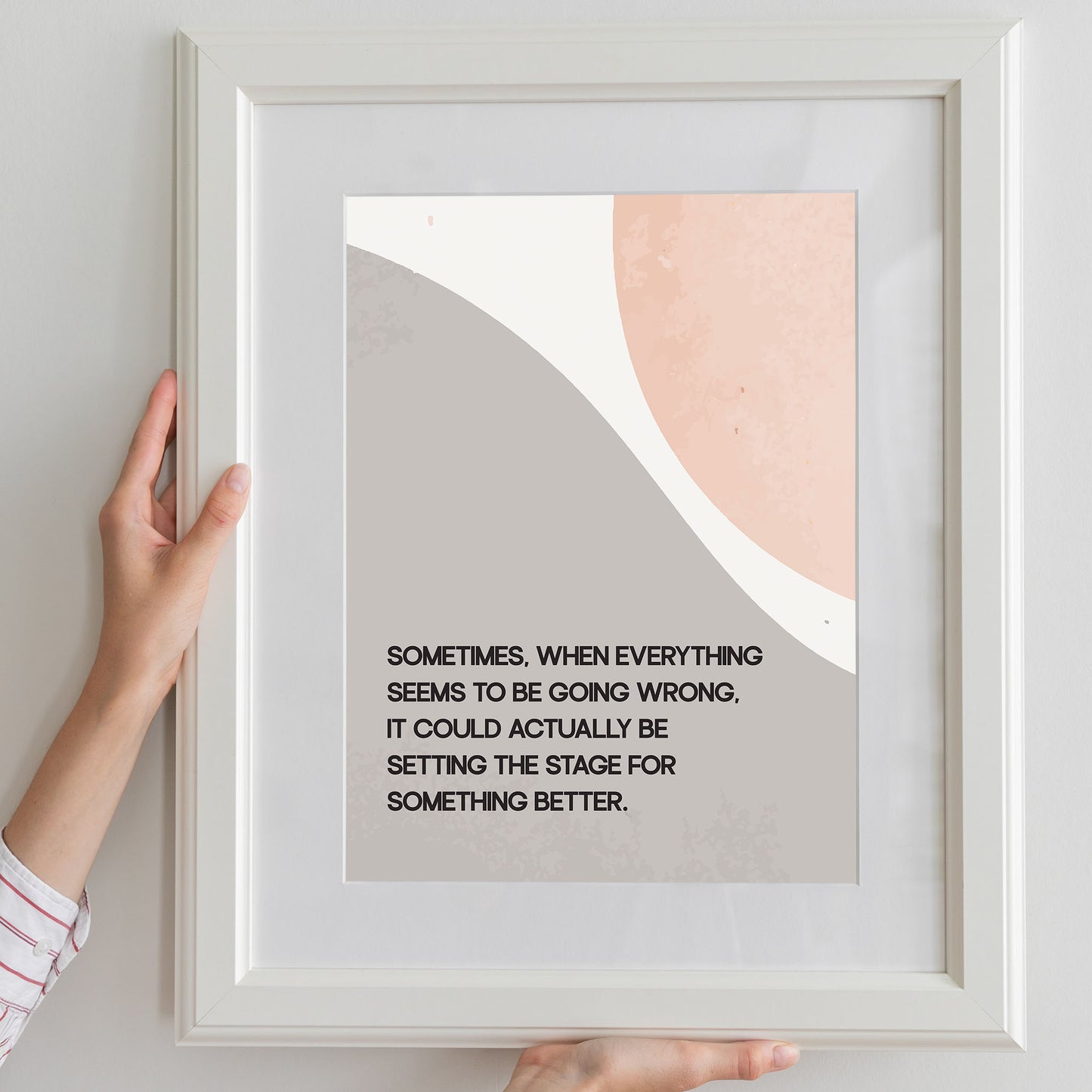 Modern motivational printable wall art featuring the quote 'Sometimes, when everything seems to be going wrong, it could actually be setting the stage for something better' in black text over abstract curved shapes in soft beige and peach tones, perfect for uplifting and calming interior spaces