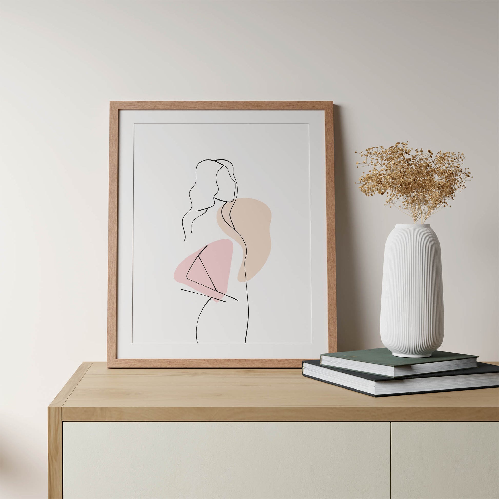 Abstract minimalist line art of a woman with soft pink and beige geometric shapes, modern boho-style printable wall decor with feminine elegance
