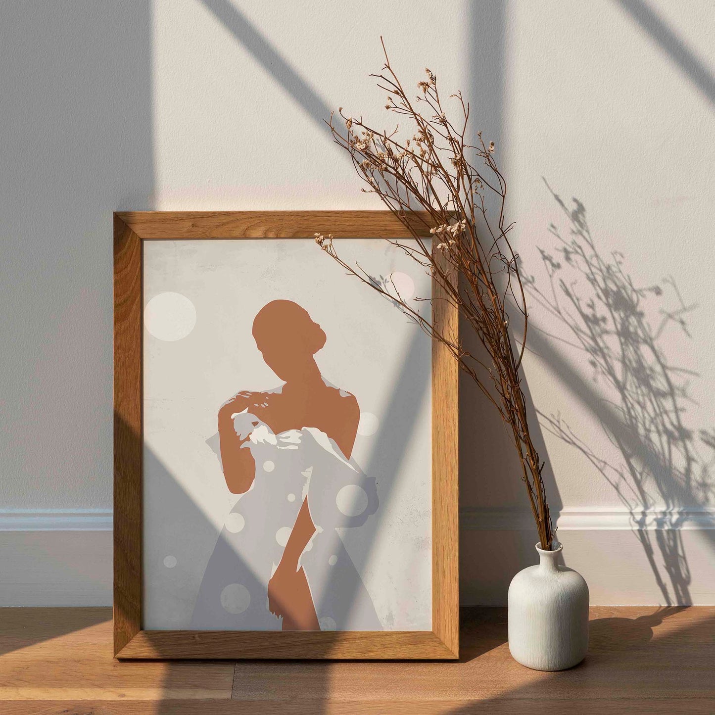 Minimalist printable wall art featuring a stylised silhouette of a woman in a flowing polka-dot dress, with soft shadows and neutral tones, evoking elegance and quiet confidence, perfect for chic, modern interiors