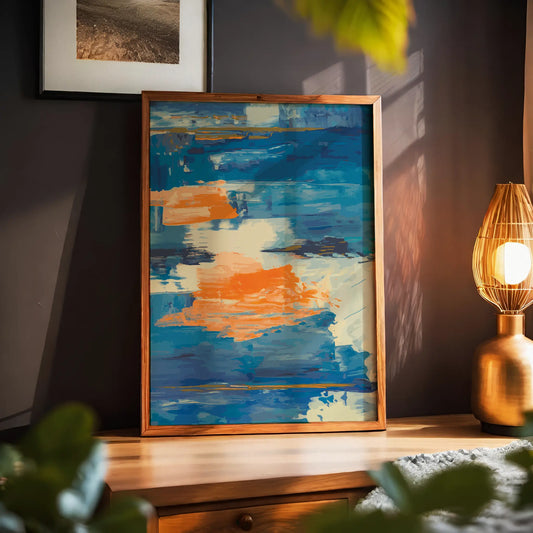 Abstract printable wall art featuring bold brushstrokes in vibrant shades of blue, orange, and cream, creating a dynamic, painterly texture inspired by water and motion, ideal for modern and artistic interiors