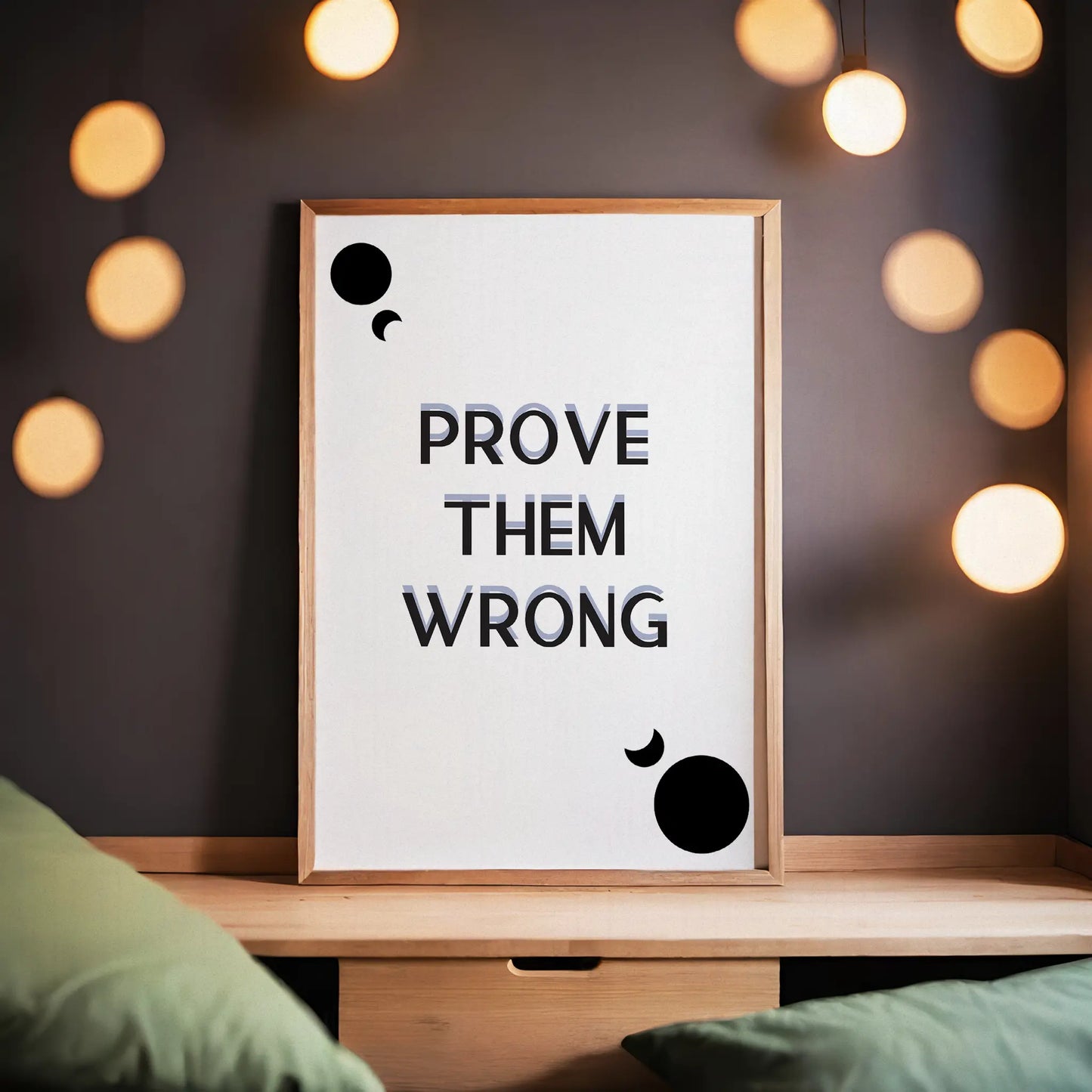 Minimalist motivational printable wall art with the bold quote 'Prove Them Wrong' in modern black gradient typography, accented by abstract black circles and crescent shapes on a clean white background, ideal for office, gym, or study space inspiration