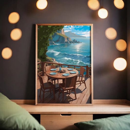 Scenic coastal printable wall art depicting a round wooden dining table set for five on a sunlit deck overlooking turquoise ocean waves and rocky cliffs under a bright blue sky, perfect for beach house, oceanview, or outdoor dining-inspired decor.