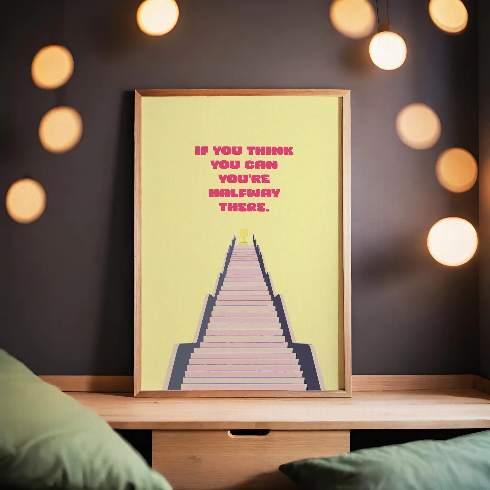 Motivational printable wall art featuring the quote 'If you think you can, you're halfway there' in bold pink text above a stylised staircase leading to a golden trophy, perfect for inspiring determination and positivity in home offices, gyms, or study areas.