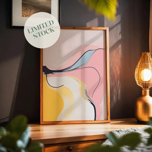 Modern abstract printable wall art featuring flowing shapes in soft pink, yellow, cream, and blue tones with bold black lines, creating a playful yet elegant minimalist aesthetic