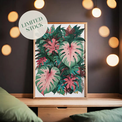 Tropical botanical printable wall art featuring a lush arrangement of pink and green monstera and philodendron leaves, ideal for jungle-themed or nature-inspired home decor.