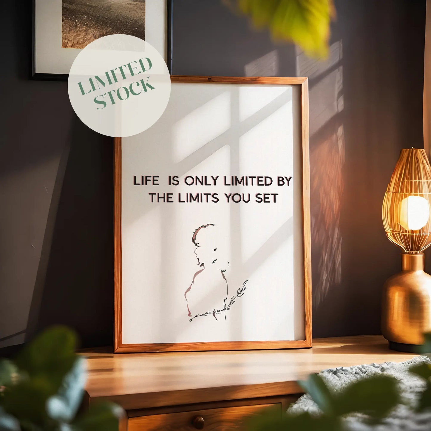Minimalist motivational printable wall art featuring the quote 'Life is only limited by the limits you set' with a delicate line drawing of a woman holding a leafy branch, perfect for inspiring modern, calm, and empowering spaces