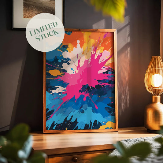 Vibrant abstract printable wall art featuring an explosive splash of bold colours including pink, blue, orange, yellow, and white, perfect for energising modern interiors or creative spaces
