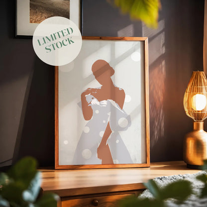 Minimalist printable wall art featuring a stylised silhouette of a woman in a flowing polka-dot dress, with soft shadows and neutral tones, evoking elegance and quiet confidence, perfect for chic, modern interiors