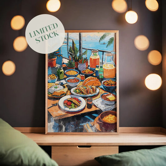 Colorful printable wall art of a festive Mexican dining table filled with tacos, rice, pasta, fresh vegetables, drinks, and juices, set against a scenic seaside view with potted plants and sailboats in the distance.