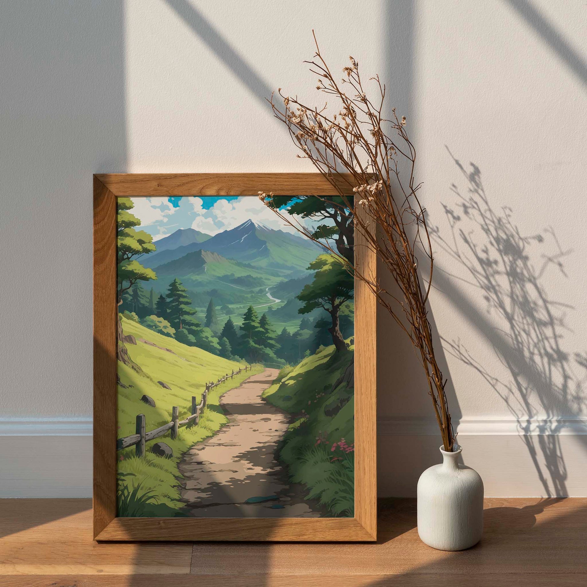 Peaceful nature landscape featuring a winding dirt path through bright green hills, lined with a rustic wooden fence. Tall trees frame the scene, leading the eye toward distant blue mountains, rolling forests, and a river glistening under a sky filled with fluffy white clouds.