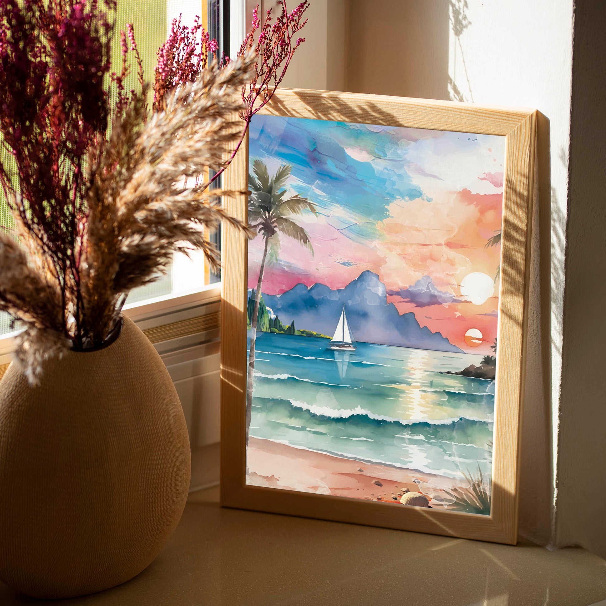 Watercolor-style printable wall art of a tropical beach sunset with palm trees, ocean waves, a sailboat, and mountains in the distance under a colorful sky