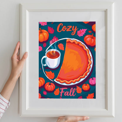 Dopamine-style fall food print with hand-lettered "Cozy Fall" text, a sliced pumpkin pie on a white plate, hot coffee, and orange and magenta pumpkins on a rich teal backdrop