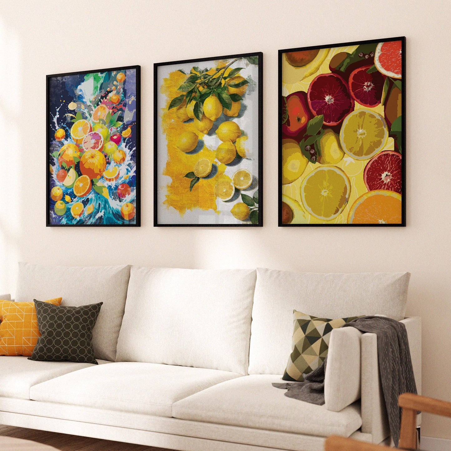 Triptych wall art with bold citrus illustrations including lemon branches, sliced fruit and colourful juice splash design