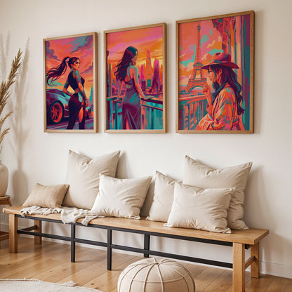 SweetPixelCreations Dreamy Portrait prints propped on a wood ledge against sage wainscoting — empowered women in cinematic urban and European settings in a cohesive bold palette of orange, teal, magenta, and coral