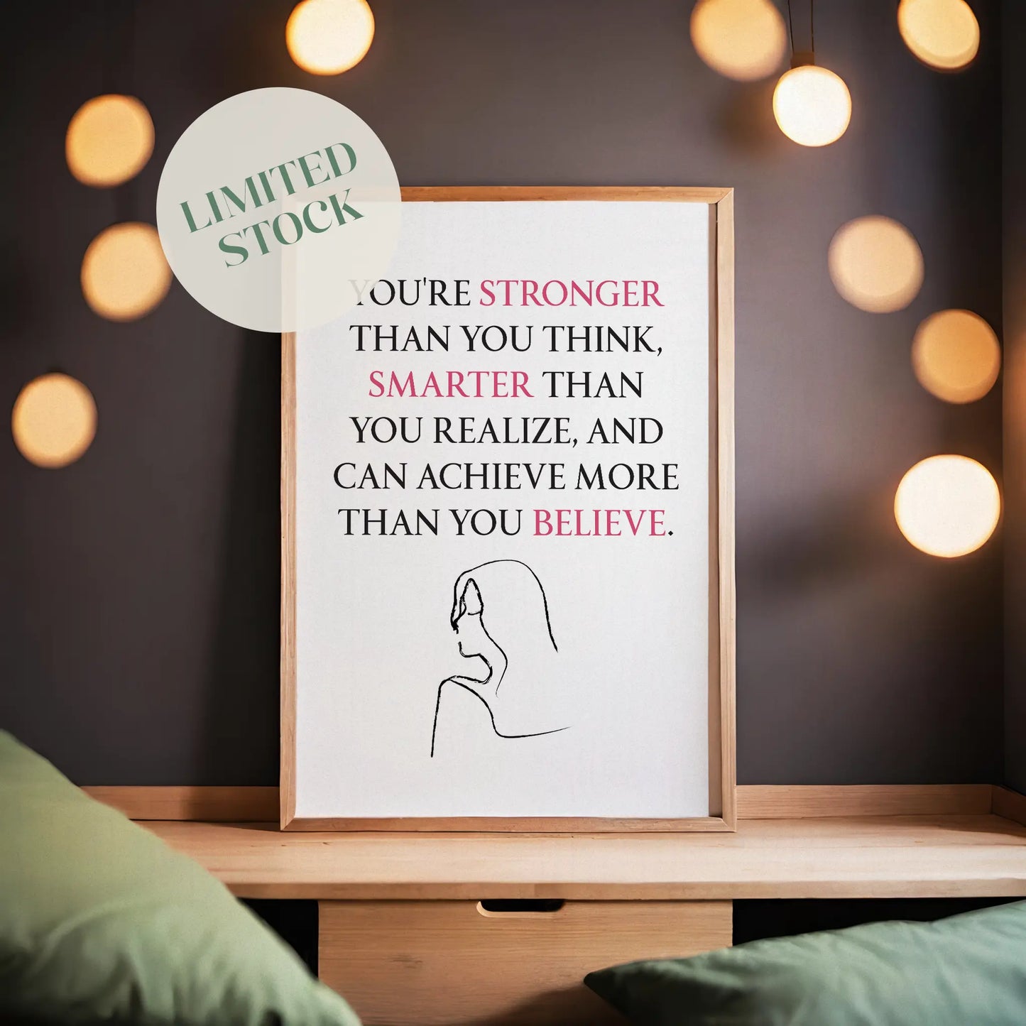Empowering printable wall art featuring the quote 'You're stronger than you think, smarter than you realize, and can achieve more than you believe' with key words highlighted in pink, paired with a minimalist line drawing of a woman, perfect for confidence-boosting modern decor.