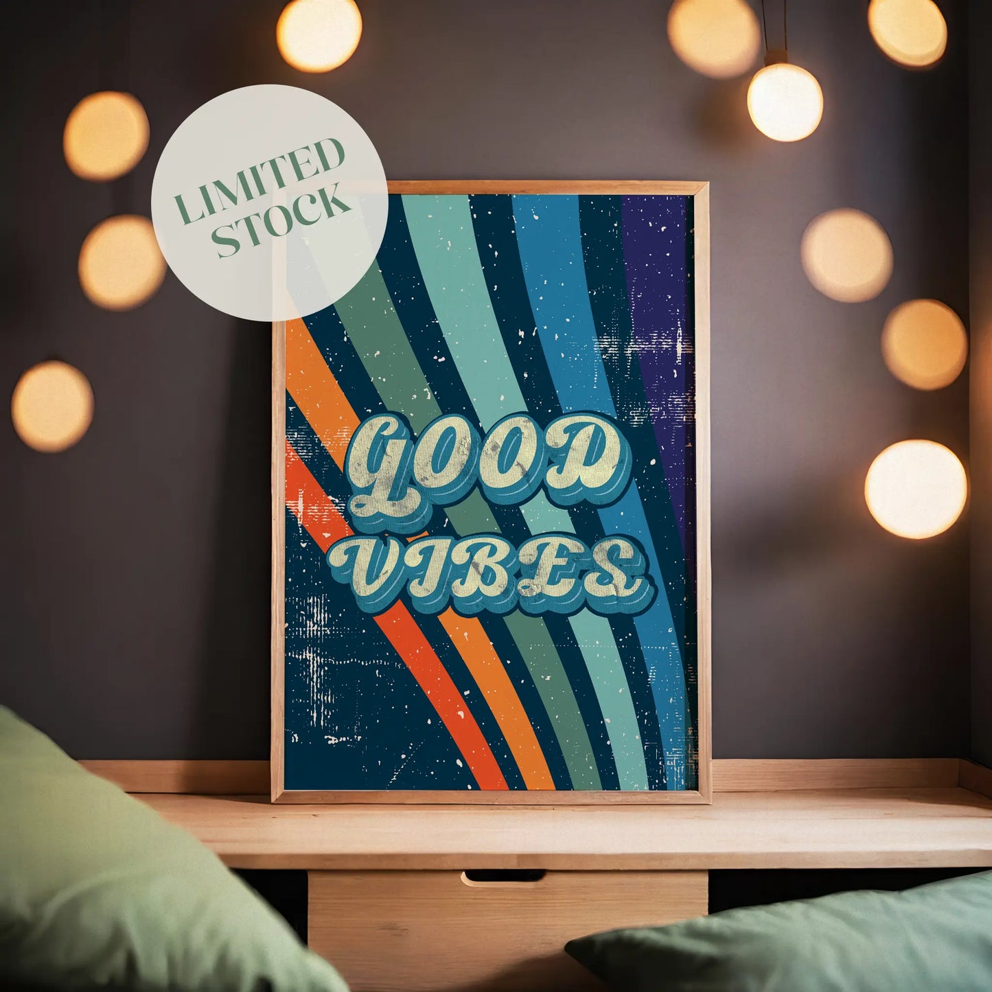 Printable wall art with a retro ‘Good Vibes’ typography in bold vintage-style letters, over a colorful striped background with a distressed, textured finish, perfect for positive, nostalgic home decor