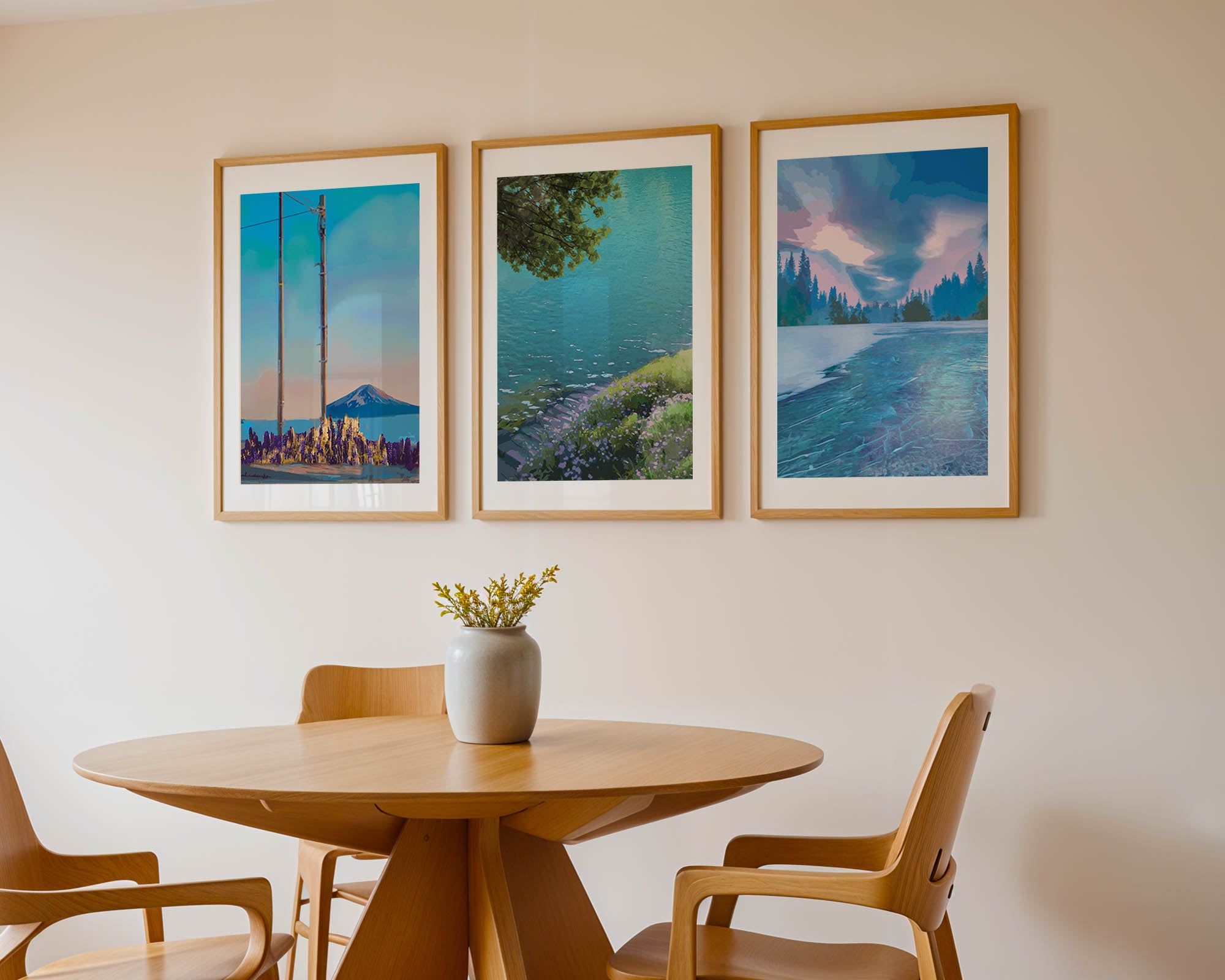 Set of three printable wall art pieces featuring serene landscape scenes with mountains, lakes, and forests
