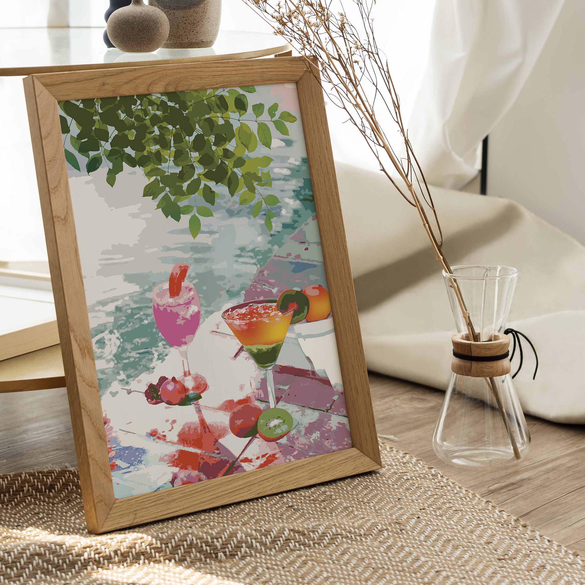Vibrant tropical cocktail art print featuring colorful drinks with fruit garnishes, set by the water under lush green leaves, ideal for summer decor or beach-inspired kitchens