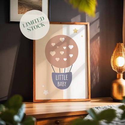 Minimalist nursery wall art featuring a pastel hot air balloon with heart shapes and the phrase "Little Baby", perfect for baby rooms, gender-neutral decor, or baby shower gifts.