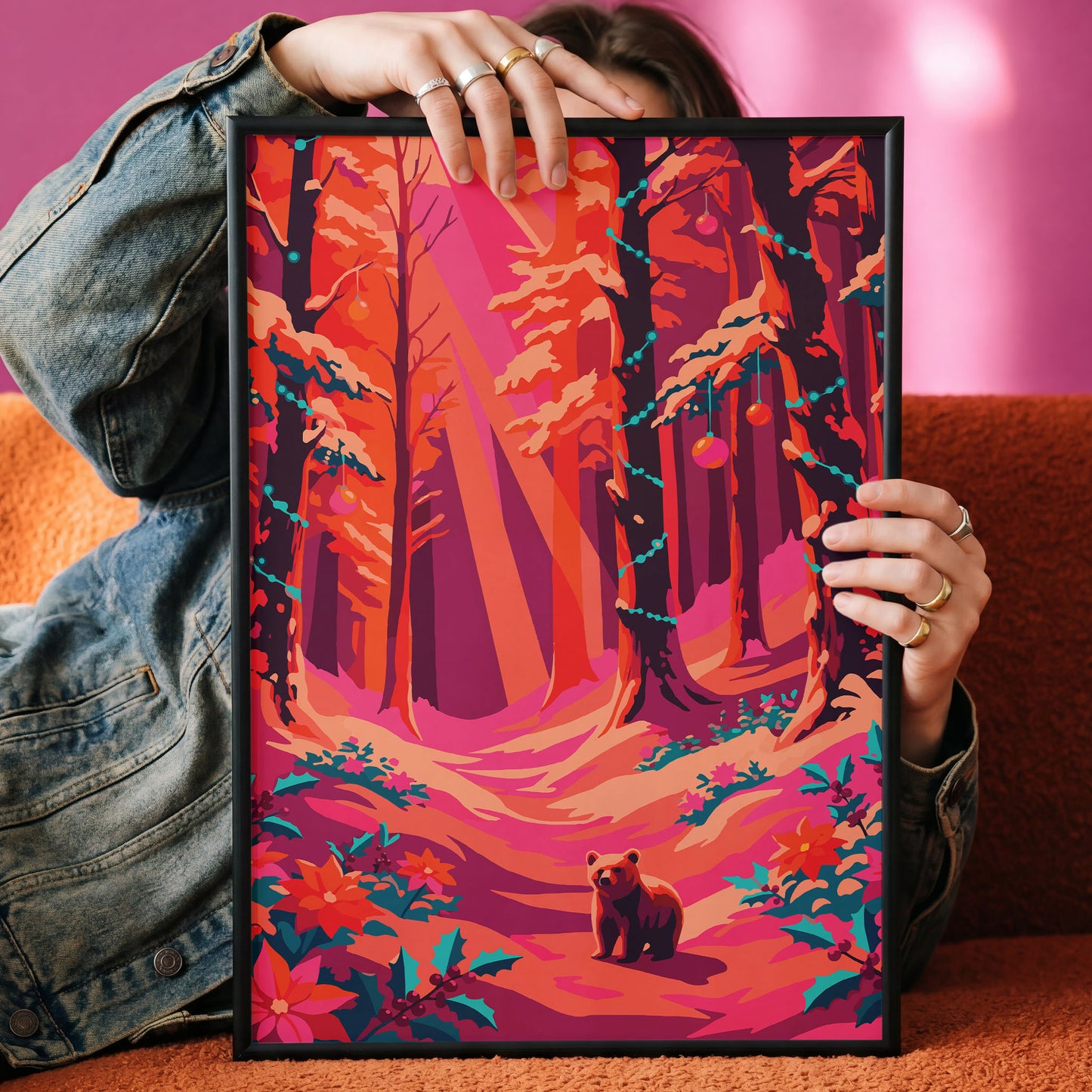 Dopamine-style winter forest print — a painterly bear cub in a dramatic warm-toned woodland scene, with teal Christmas light strings hanging between orange and plum trees, teal holly bushes, poinsettias, and a glowing light-shaft forest path in deep magenta and coral