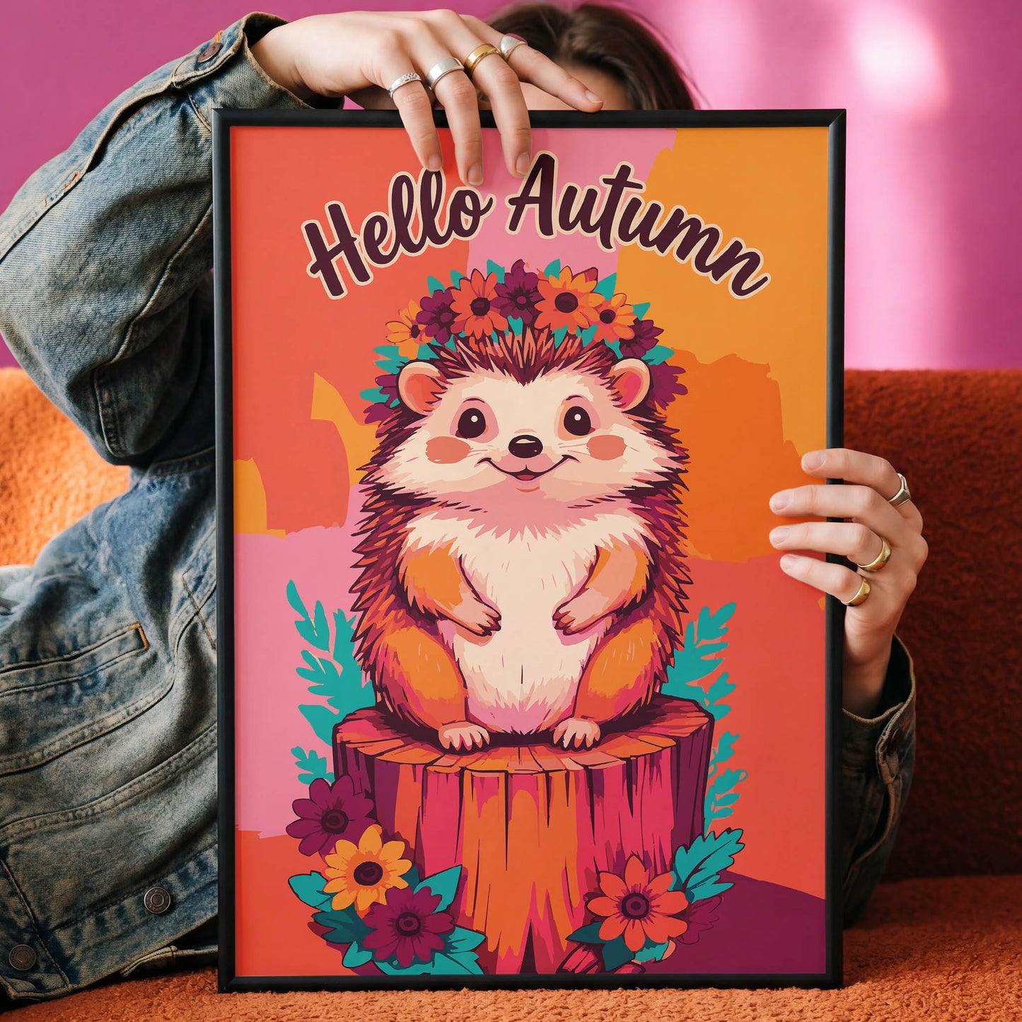Dopamine-style woodland animal print - a painterly hedgehog with a dahlia and sunflower crown perched on a rustic log, framed by teal leaves and purple blooms with arched "Hello Autumn" hand-lettered typography