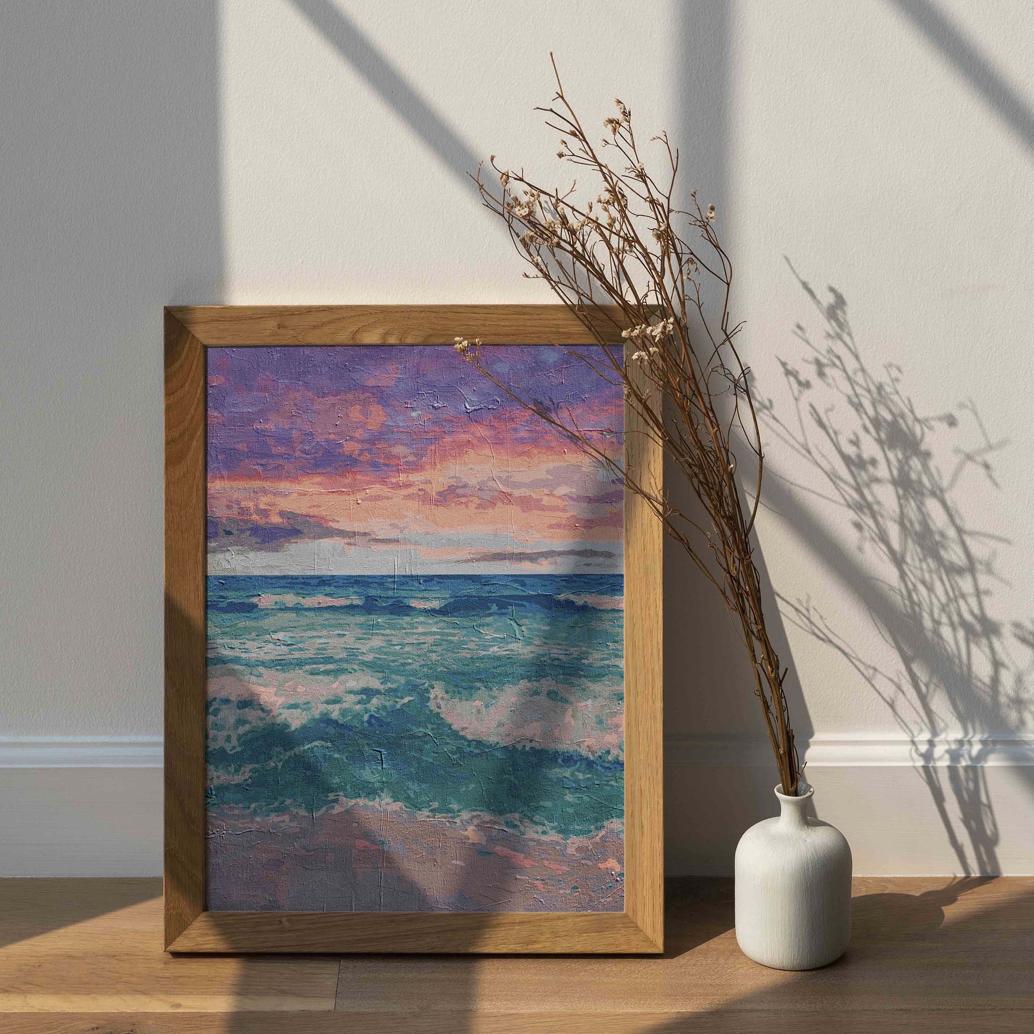 Peaceful ocean wall art featuring gentle turquoise waves rolling onto the shore beneath a vibrant pink and purple sunset sky, with a soft textured painterly effect