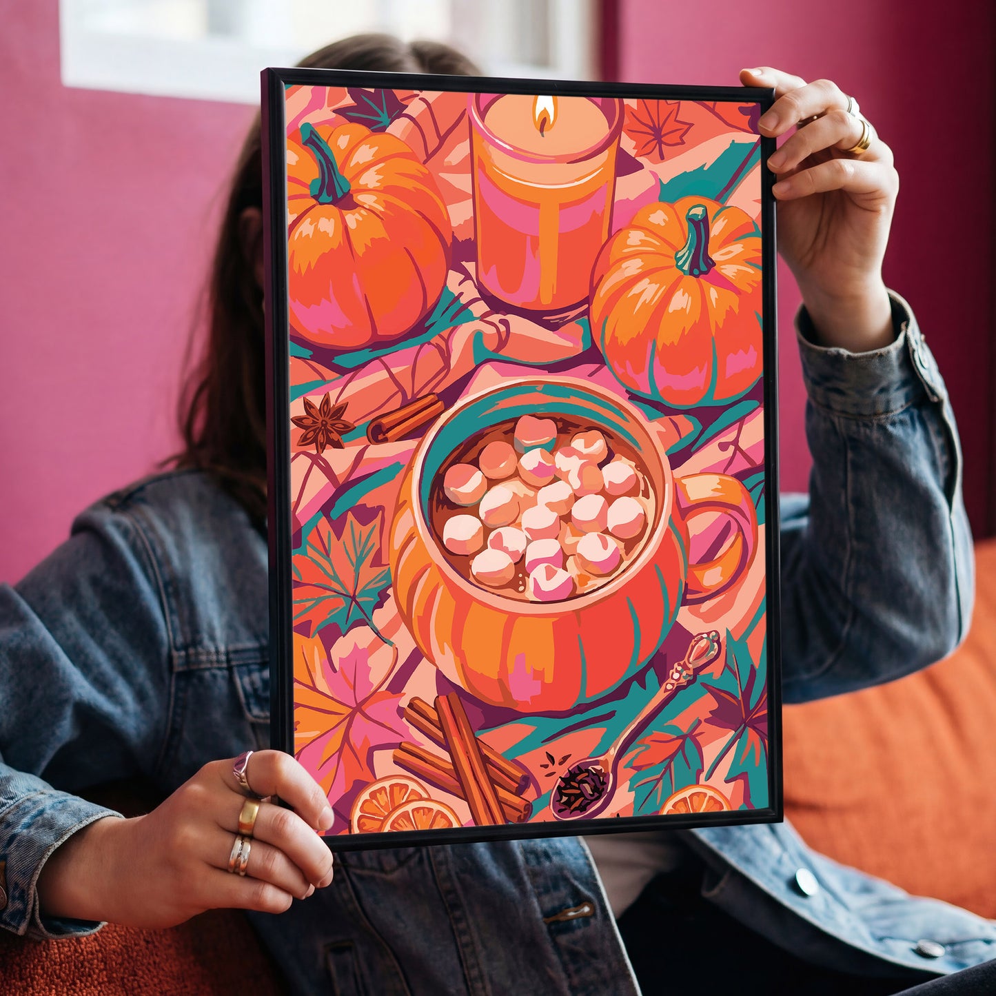 Dopamine-style hot chocolate print - a painterly orange pumpkin mug piled high with marshmallows on a warm pink and teal autumn tablescape with spices, citrus, and fall foliage