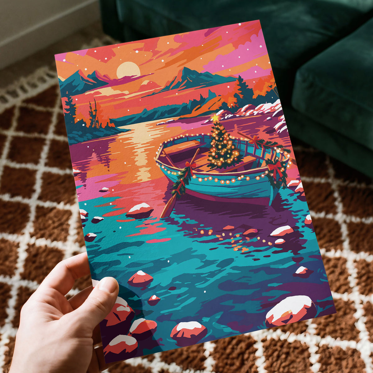 Festive lake scene illustration with a rowboat strung with lights, snow-dusted rocks, and mountain peaks in the background.