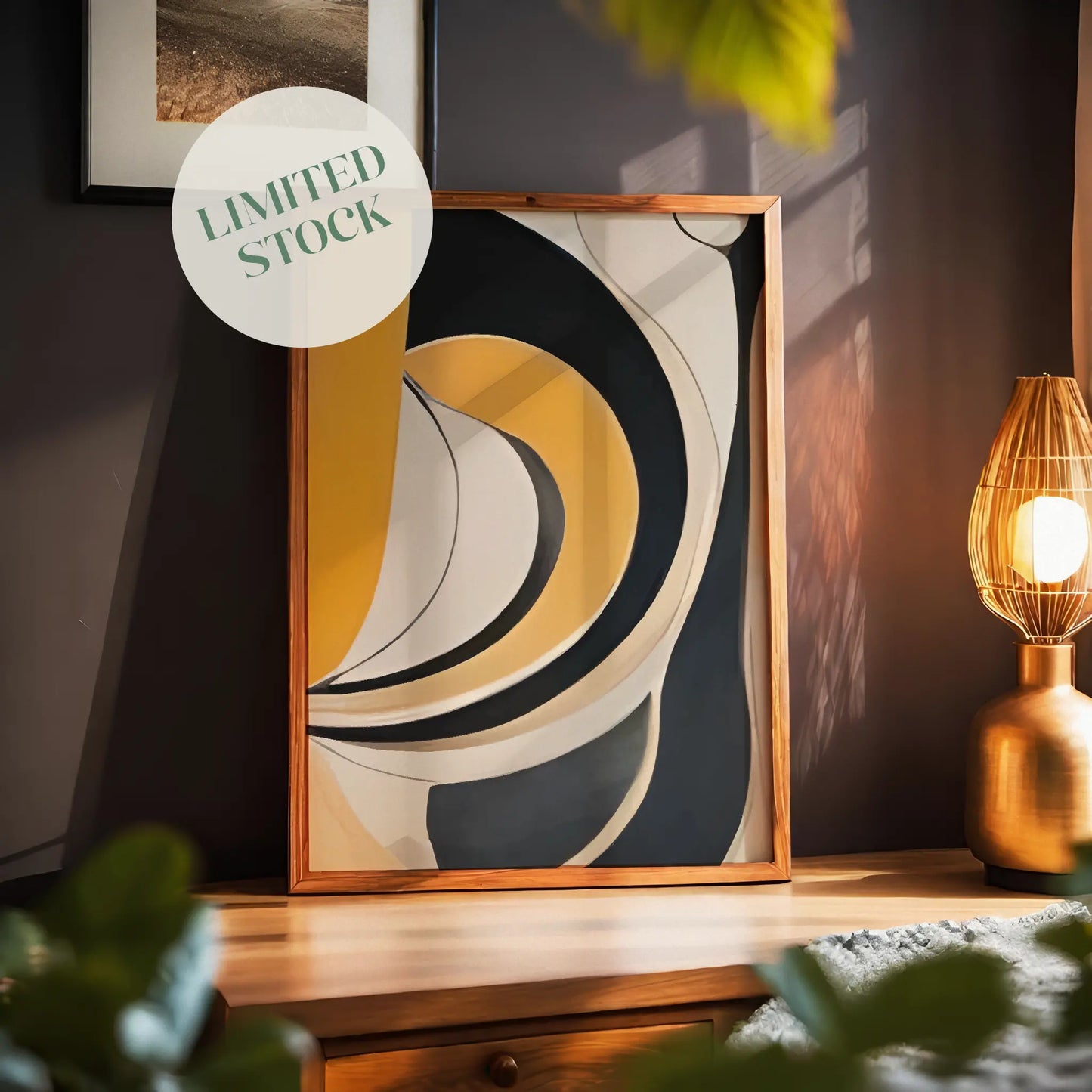 Abstract geometric wall art featuring bold curved shapes in mustard yellow, charcoal grey, beige, and off-white tones. The flowing lines and layered arcs create a modern, mid-century inspired composition with a sense of movement and balance.