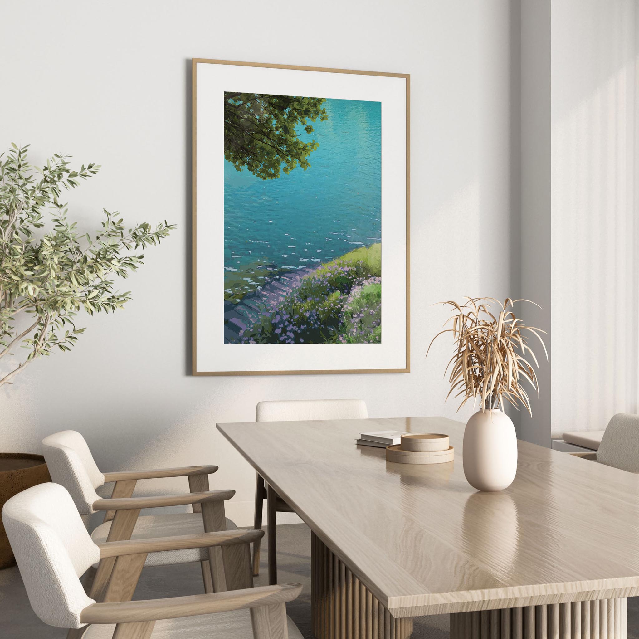 Tranquil lakeside wall art featuring crystal-clear turquoise water, a small wooden dock, and a flower-covered grassy bank under the shade of leafy tree branches