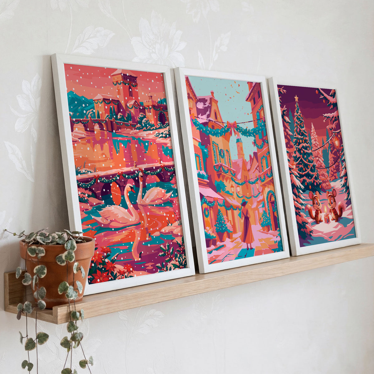Snowy pine forest print featuring two chipmunks beside a lit candle and wrapped gift