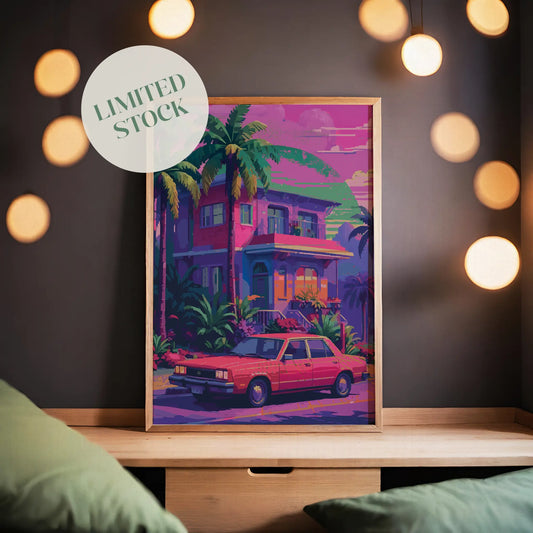 Printable wall art of a vibrant retro-style house with palm trees and a vintage red car parked out front, set against a dreamy sunset sky in pink, purple, and green hues, perfect for colorful, nostalgic home decor.