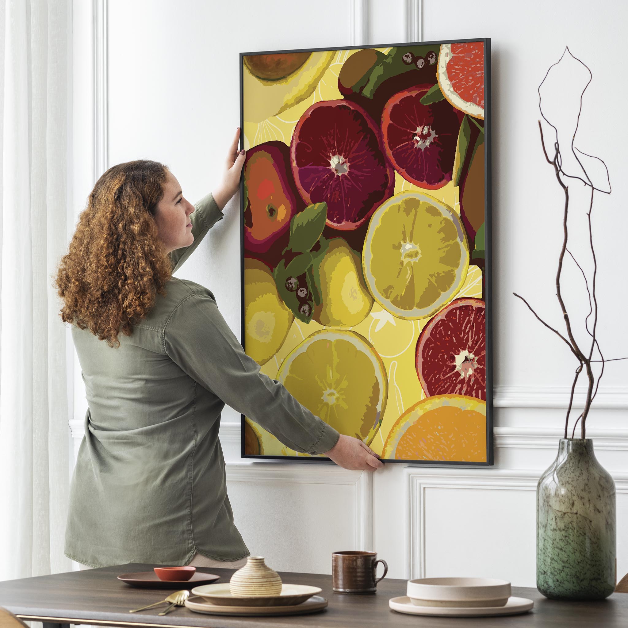 Bold and colorful printable wall art of sliced citrus fruits including blood oranges, lemons, and grapefruits on a vibrant yellow background, ideal for brightening up kitchens, cafes, or fruit-themed decor spaces