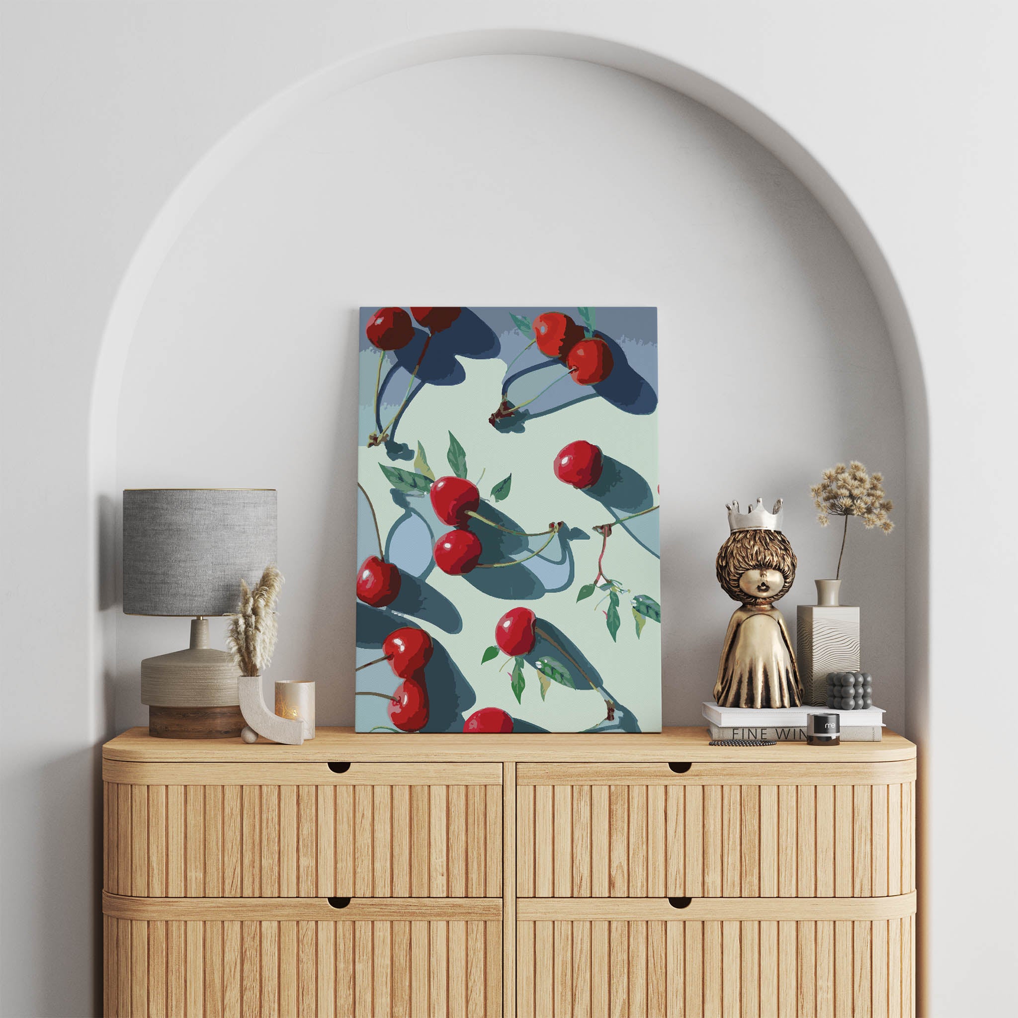 Vibrant printable wall art of glossy red cherries with green leaves casting dramatic shadows on a pale background, bold, modern kitchen or dining room decor