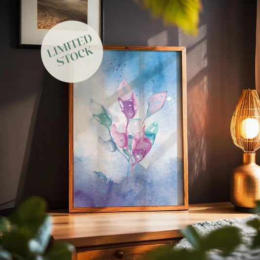 Watercolor illustration of delicate pink, purple, and green leaves on a dreamy blue and violet background, abstract botanical printable wall art for modern, tranquil interiors.