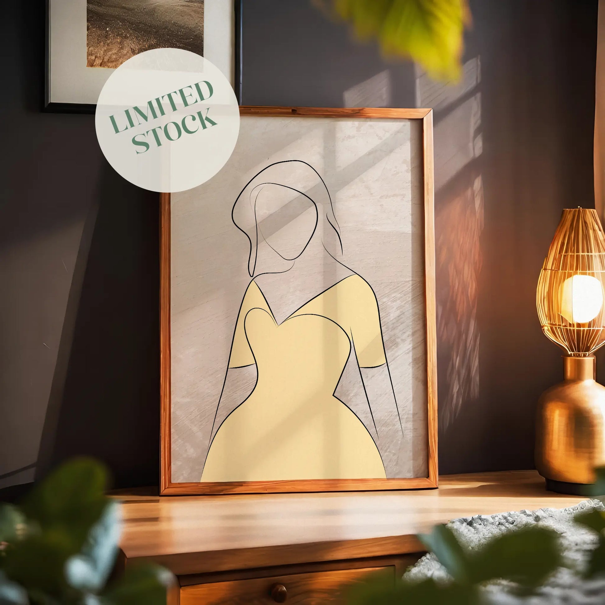 Minimalist printable wall art featuring a graceful line drawing of a woman in a soft yellow dress, set against a textured neutral background with natural light shadows, perfect for elegant, modern, and feminine interior styles