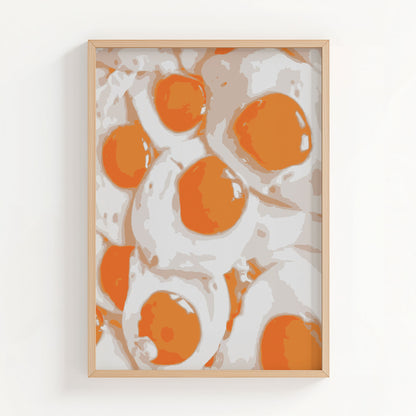 Bold and vibrant wall art print featuring a pattern of sunny-side-up eggs in modern pop-art style, perfect for kitchen decor or food lovers seeking quirky breakfast-themed art