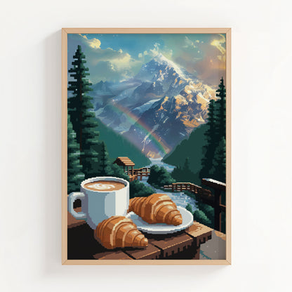 Cozy mountain-themed printable wall art featuring a cup of coffee and croissants on a wooden railing overlooking a flowing stream, lush pine trees, a rainbow, and majestic snow-covered peaks glowing in the morning light - perfect for cabin, breakfast nook, or nature lover decor